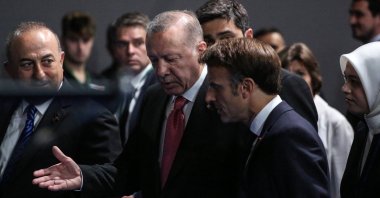 Turkish President Recep Tayyip Erdoğan (L) and French President Emmanuel Macron (R) on day two of the NATO summit at the Ifema Congress Center in Madrid, Spain, June 29, 2022. (Getty Photo)