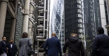 People walking around the business headquarters in the City of London, U.K., Oct. 12, 2022. (EPA Photo)