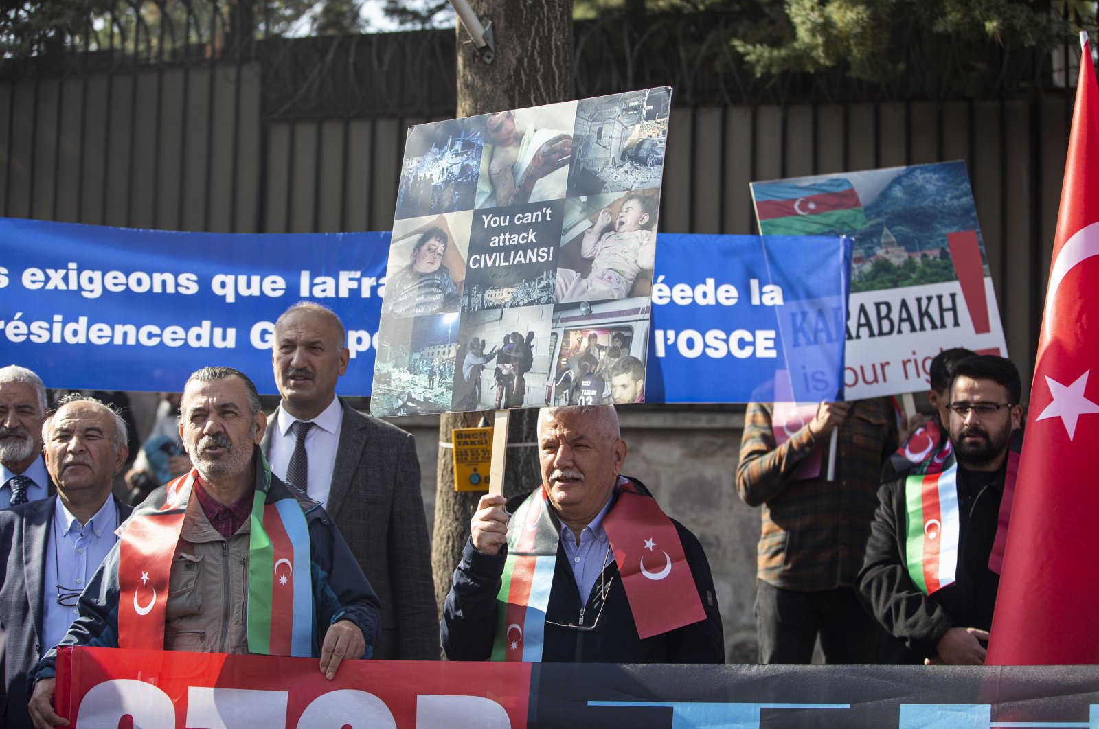 Representatives of Turkish NGOs protest a French motion proposing sanctions on Azerbaijan in front of the French Embassy in Ankara on Monday, Nov. 7, 2022 (AA Photo)