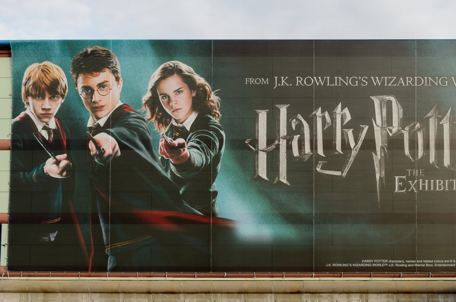 Daniel Radcliffe (C), Emma Watson (R) and Rupert Grint on the poster of the &quot;Harry Potter,&quot; exhibition, Madrid, Spain, Nov. 22, 2017. (Shutterstock Photo)