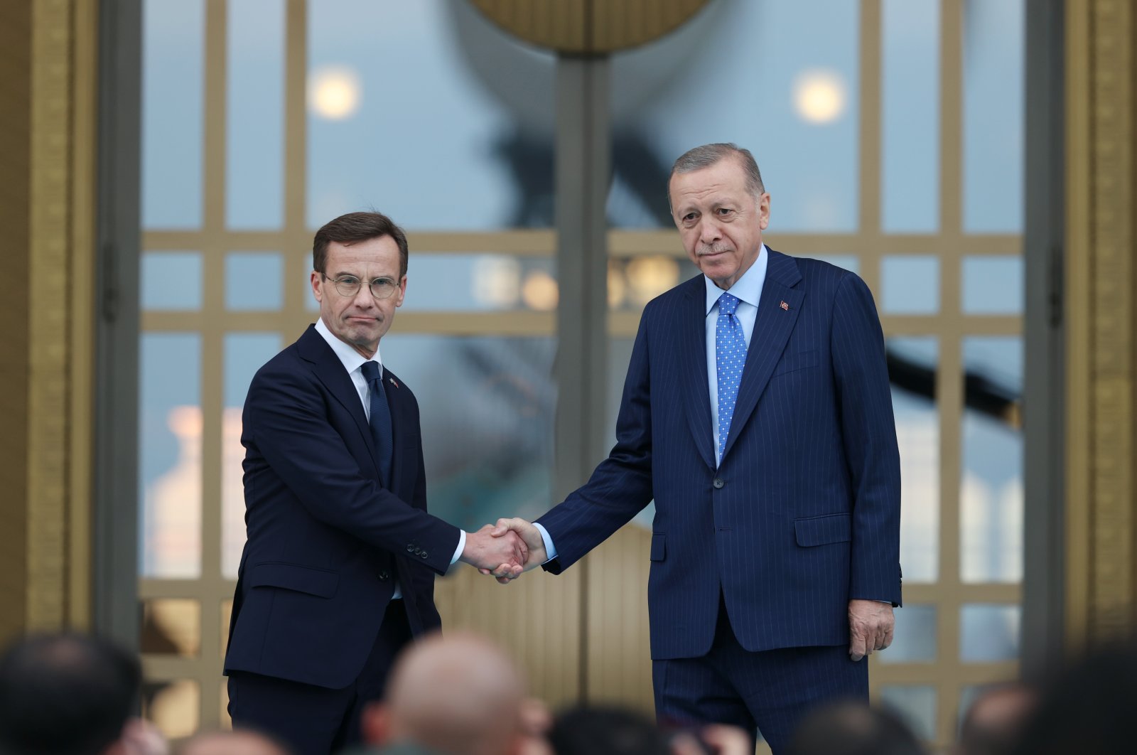President Recep Tayyip Erdoğan, Swedish Prime Minister Ulf Kristersson shake hands following an official ceremony in Ankara, Nov. 8, 2022. (AA Photo)