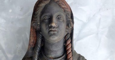 A handout photo made available by the University for Foreigners of Siena shows a female statue found during the discovery of a votive deposit in the excavations of San Casciano dei Bagni, Tuscany, Italy, Nov. 7, 2022. (EPA Photo)