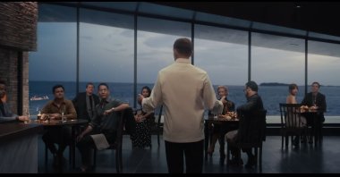 A still shot from &quot;The Menu&quot; shows Ralph Fiennes as celebrated American chef Julian Slowik.