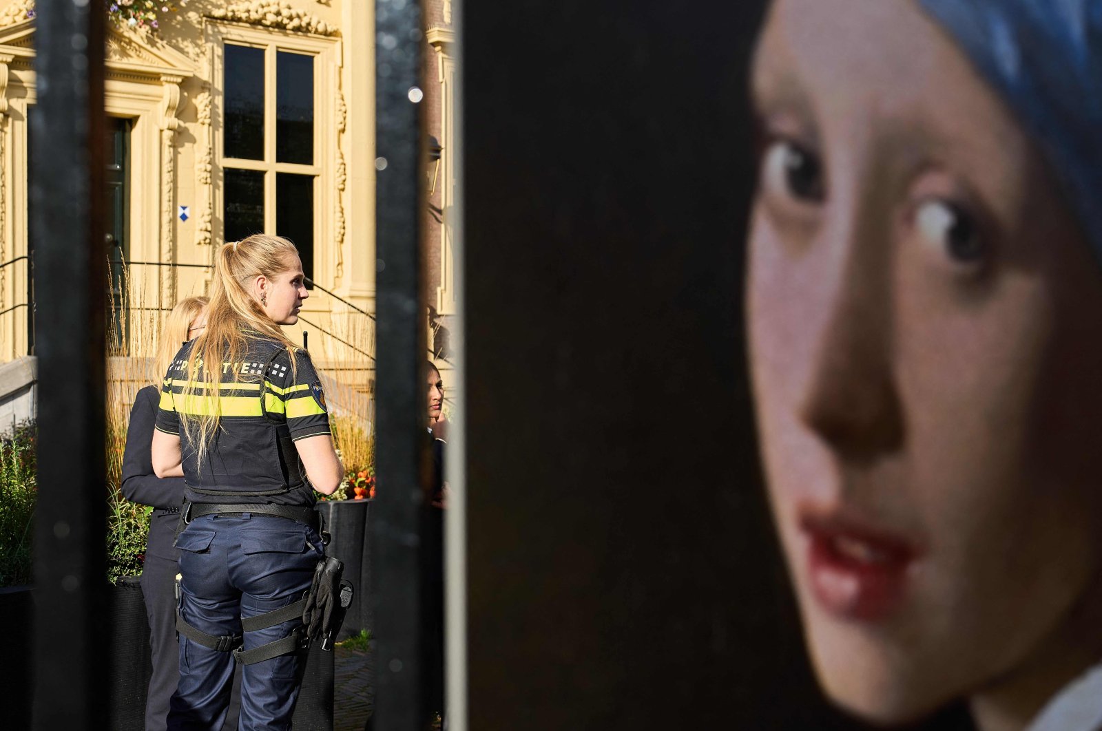 A police woman stands guard outside the Mauritshuis museum after an attempt to smear the Johannes Vermeer&#039;s painting &quot;Girl with a Pearl Earring&quot; in The Hague, Oct. 27, 2022.