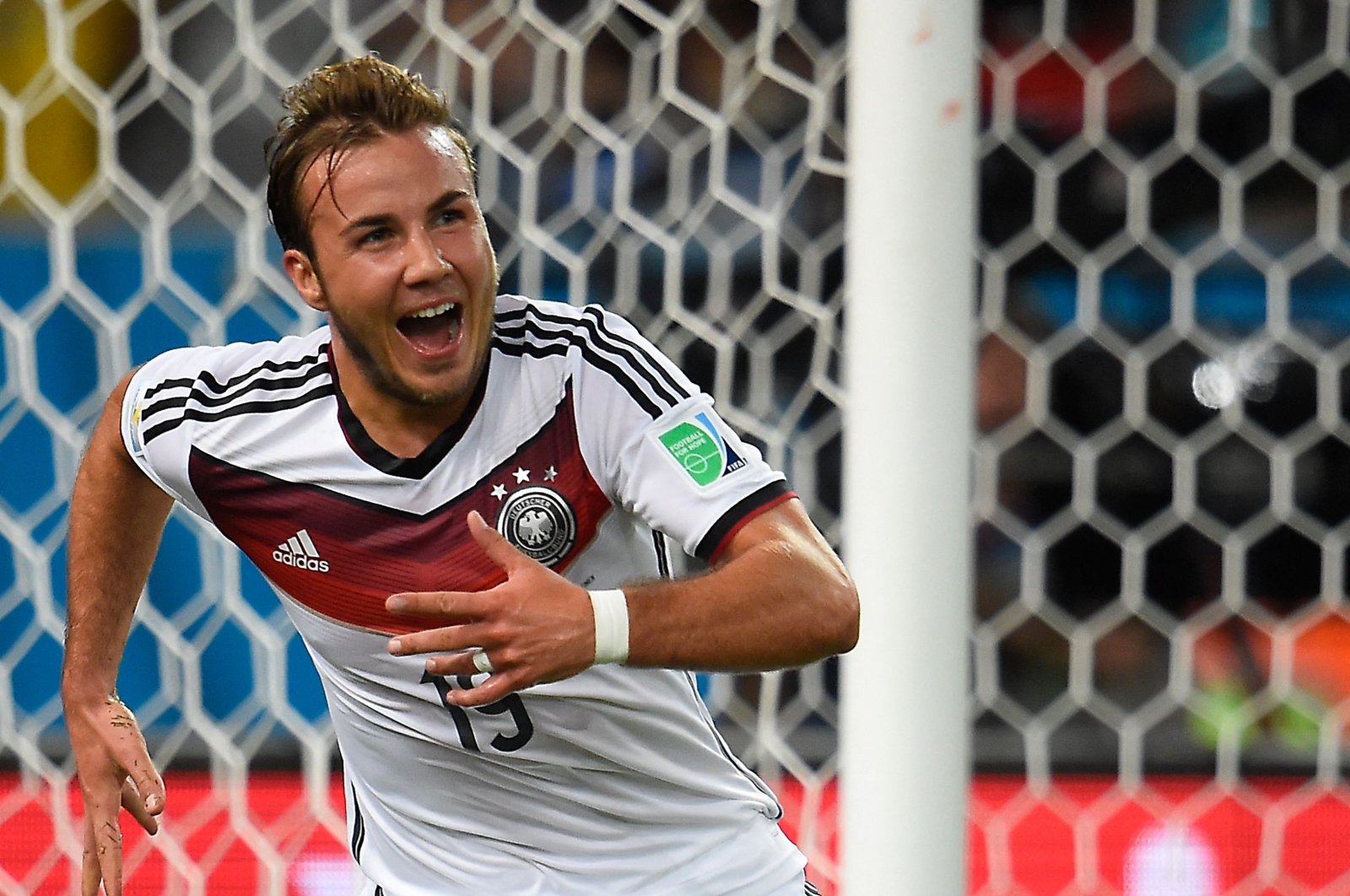 Germany&#039;s forward Mario Gotze celebrates after scoring the winning 1-0 goal during the second half of extra-time during the 2014 FIFA World Cup final football match between Germany and Argentina at the Maracana Stadium, Rio de Janeiro, Brazil, July 13, 2014. (AFP Photo)