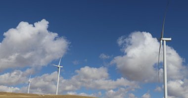 Wind turbines, as an alternative to fossil fuels, can help combat climate change. (AA File Photo)