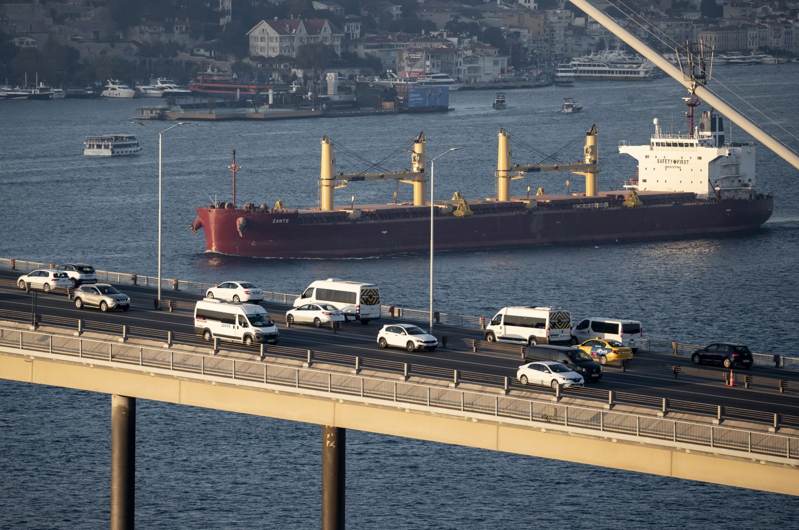 The cargo ship Zante, carrying Ukrainian grain,sails through the Bosporus behind the Martyrs Bridge, in Istanbul, Türkiye, Nov. 2, 2022. (EPA Photo)