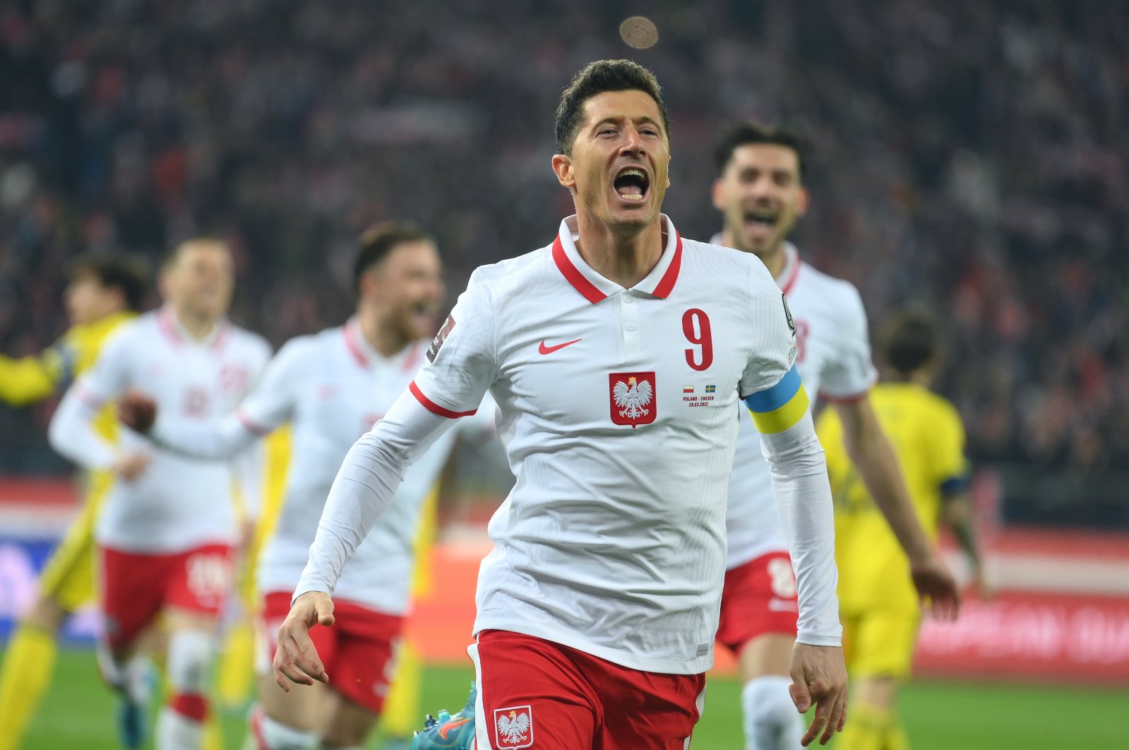 Poland&#039;s Robert Lewandowski celebrates after scoring during the 2022 FIFA World Cup qualifier knockout round playoff match between Poland and Sweden, Chorzow, Poland, March 29, 2022. (Getty Images Photo)