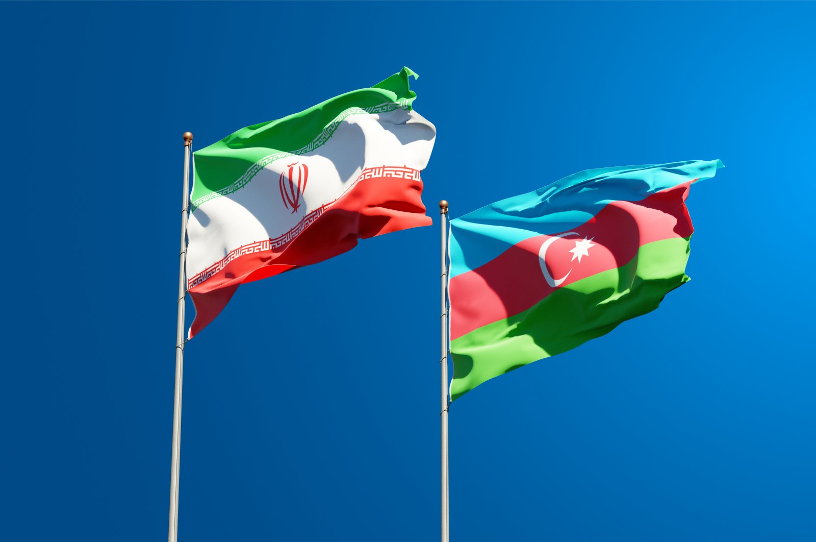 The flags of Iran and Azerbaijan in this undated file photo. (Shutterstock File Photo)