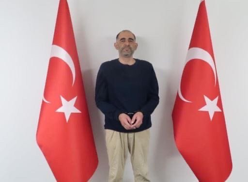 FETÖ terrorist group member, fugitive Uğur Demirok after being captured by Turkish intelligence, Nov. 12, 2022. (AA Photo)