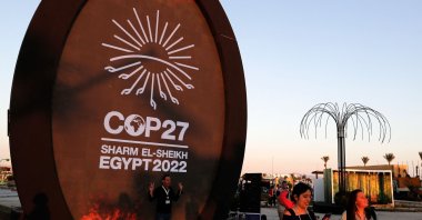 People walk in the green zone of the International Convention Centre, during the COP27 climate conference, Sharm el-Sheikh, Egypt, Nov. 9, 2022. (AFP Photo)