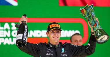 George Russell of Mercedes and Great Britain celebrates winning his first Grand Prix during the F1 Grand Prix of Brazil at Autodromo Jose Carlos Pace, Sao Paulo, Brazil, Nov. 13, 2022. (Getty Images Photo)