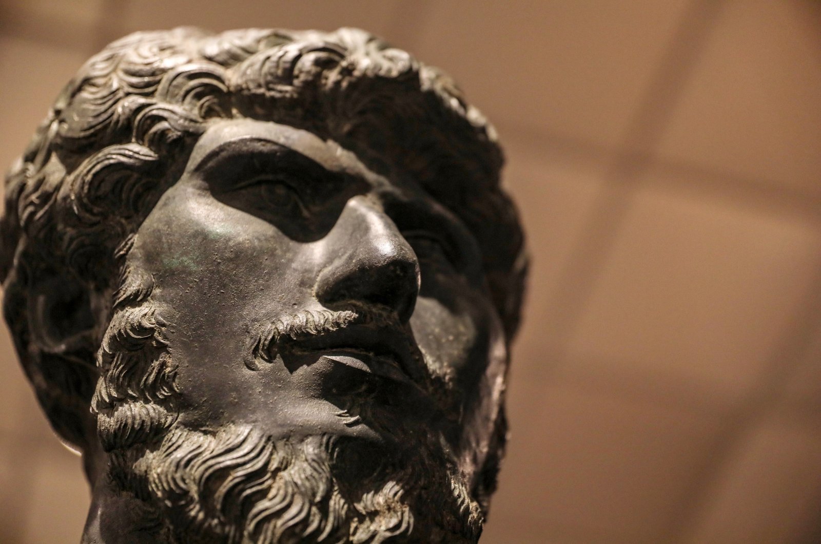The head of a bronze statue of Roman Emperor Lucius Verus is on display in Antalya, Türkiye, Nov. 13, 2022. (DHA Photo)