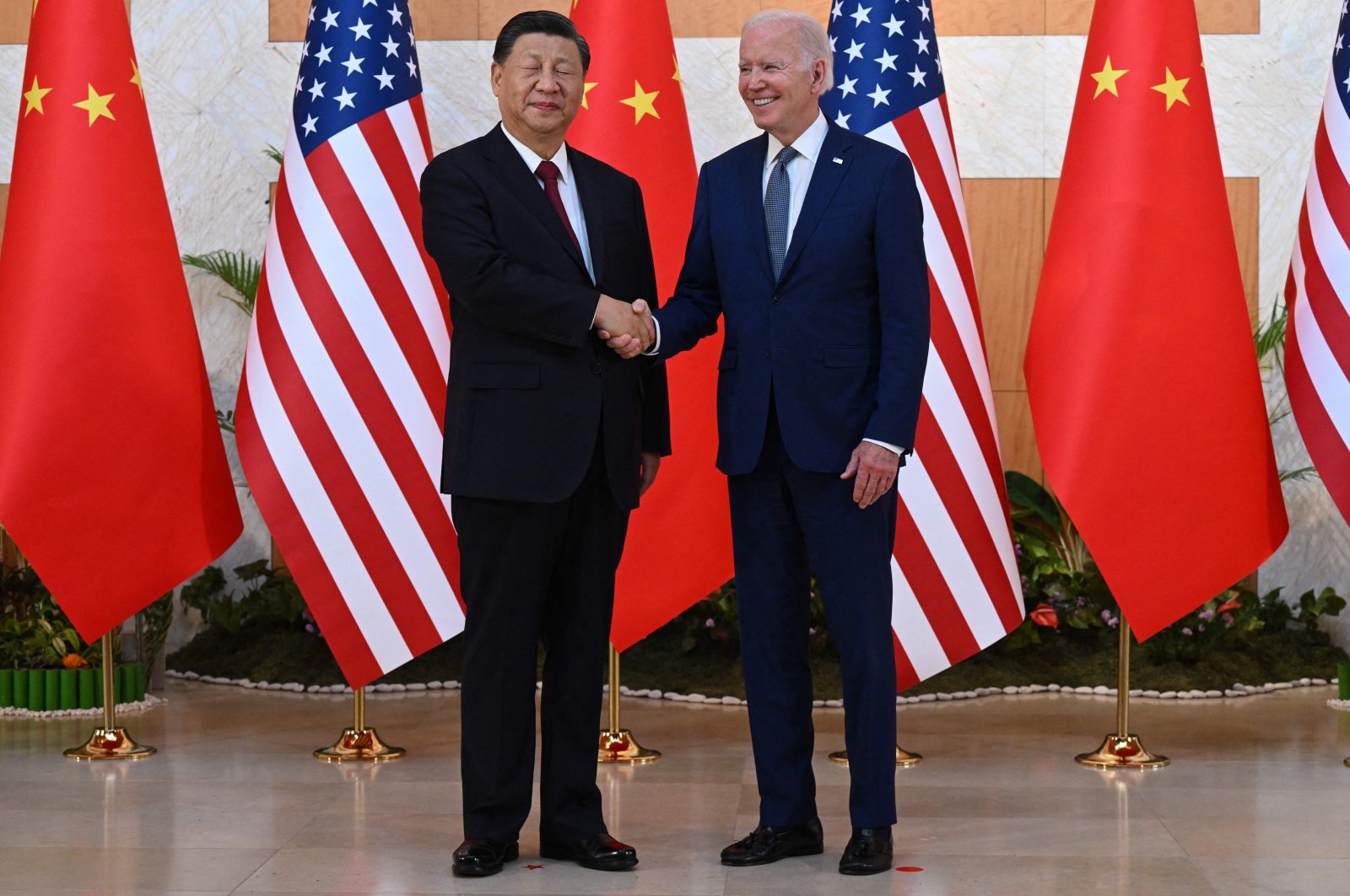 U.S. President Joe Biden (R) and China&#039;s President Xi Jinping (L) shake hands as they meet on the sidelines of the G-20 Summit, Bali, Indonesia, Nov. 14, 2022. (AFP Photo)