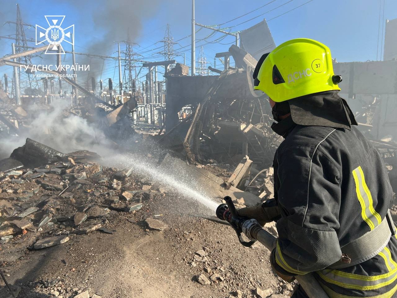 Firefighters work to put out a fire at energy infrastructure facilities, damaged by Russian drone strike, as Russia&#039;s attack on Ukraine continues, in Kyiv region, Ukraine Oct. 31, 2022.  (State Emergency Service of Ukraine/Handout via Reuters) 
