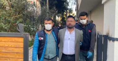 Police officers escort a detained suspect, in Mersin, southern Türkiye, Nov. 15, 2022. (IHA Photo)