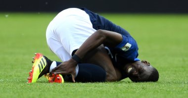 Paul Pogba of France lies on the pitch injured during the 2018 FIFA World Cup Russia Group C match between France and Australia at Kazan Arena, Kazan, Russia, June 16, 2018. (Getty Images Photo)