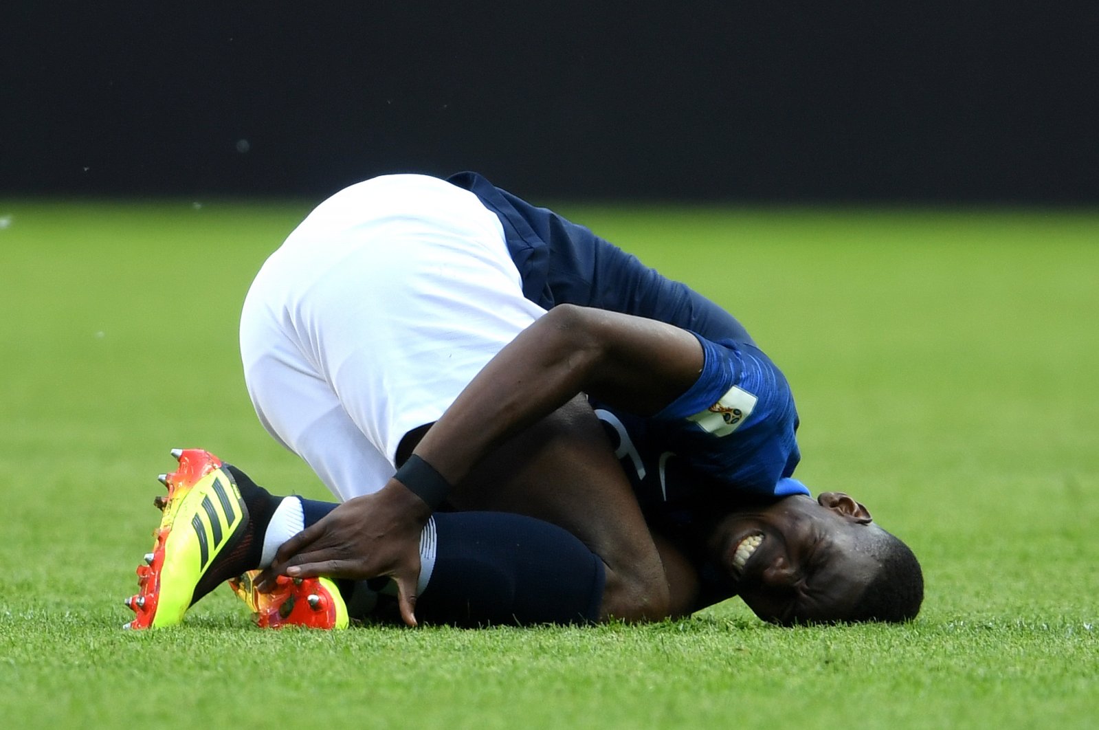 Paul Pogba of France lies on the pitch injured during the 2018 FIFA World Cup Russia Group C match between France and Australia at Kazan Arena, Kazan, Russia, June 16, 2018. (Getty Images Photo)