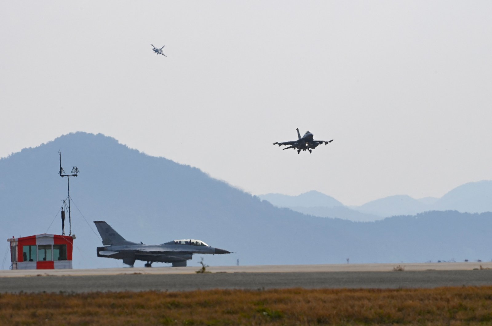 A South Korean Air Force KF-16 fighter jet (bottom left) and U.S. Air Force F-16 fighter jets during a U.S.-South Korea joint aerial drill called &quot;Vigilant Storm&quot; at Gunsan Air Base in Gunsan, South Korea, Oct. 31, 2022  (South Korean Defense Ministry via AFP)