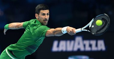 Novak Djokovic of Serbia in action against Stefanos Tsitsipas of Greece during their group match of the Nitto ATP Finals 2022 tennis tournament at the Pala Alpitour arena, Turin, Italy, Nov. 14 2022. (EPA Photo)