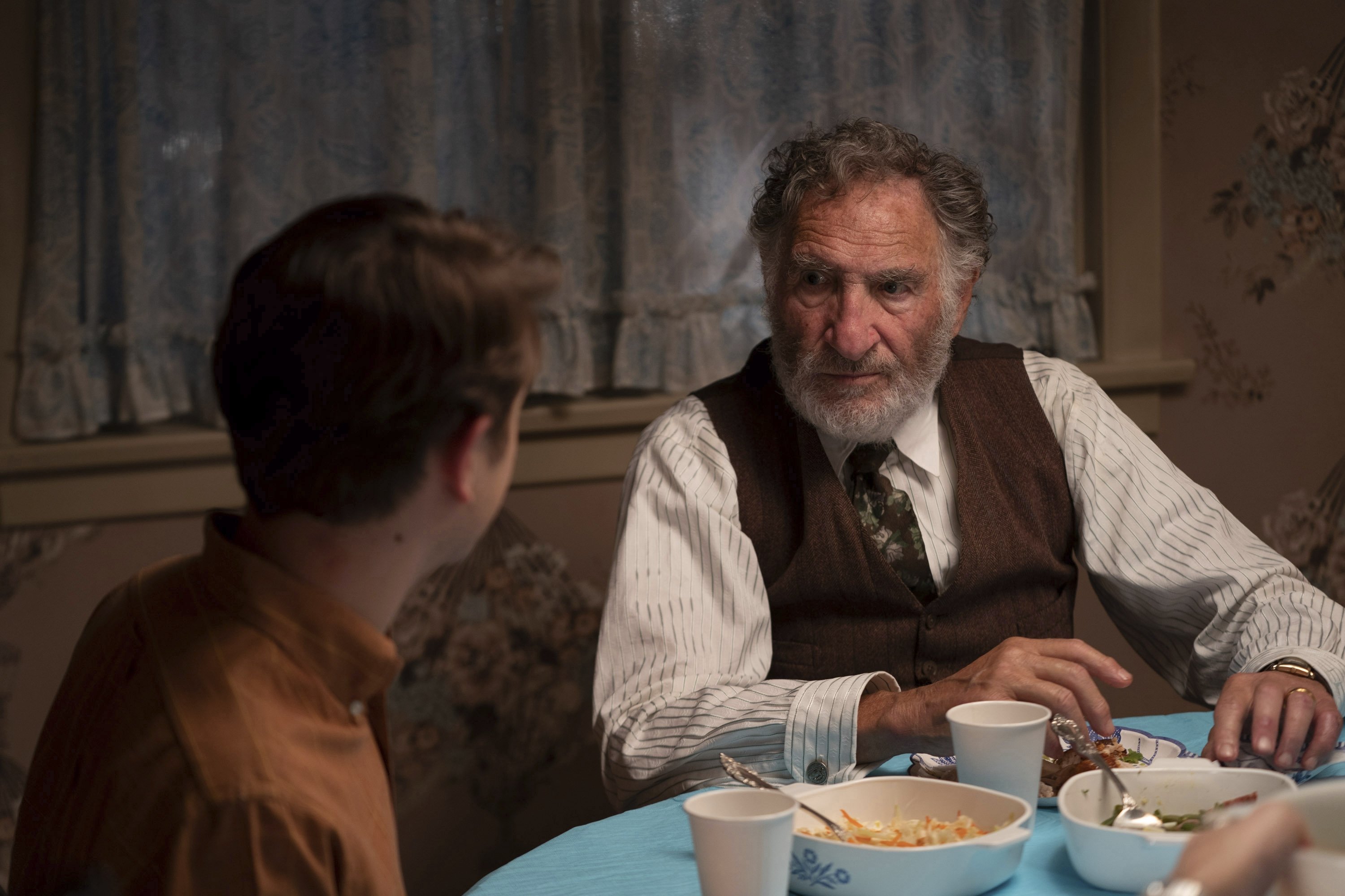 This image released by Universal Pictures and Amblin Entertainment shows Gabriel LaBelle (L) and Judd Hirsch in a scene from "The Fabelmans." (AP Photo)