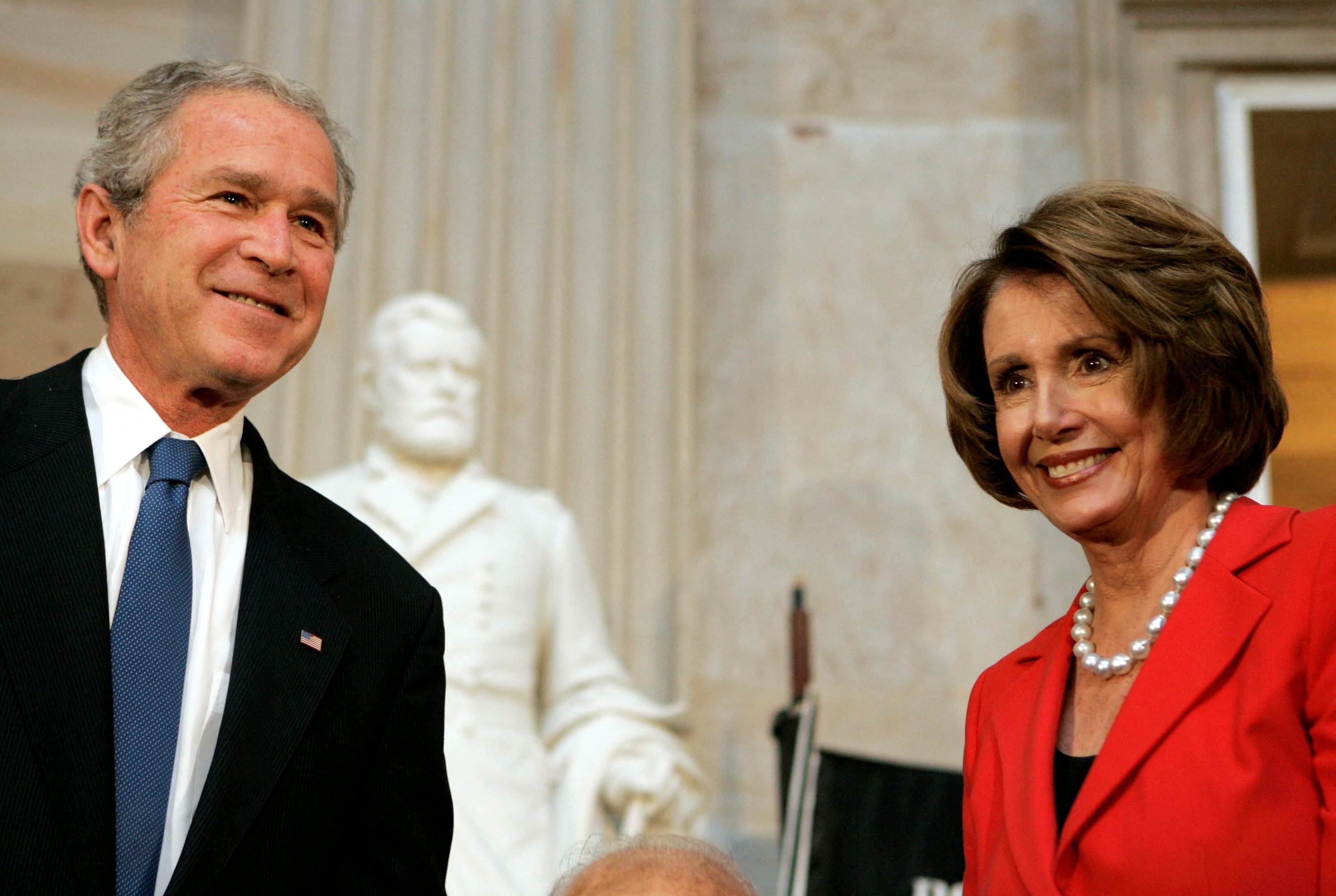 U.S. President George W. Bush (L) and Speaker of the House Nancy Pelosi attend the Congressional Gold Medal ceremony awarding the nation's highest civilian honor to Dr. Michael Ellis DeBakey (not pictured) in the capitol rotunda on Capitol Hill in Washington, U.S., April 23, 2008. (Reuters File Photo)