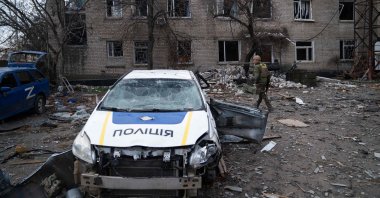 A Ukrainian soldier inspects a destroyed police station that was used by Russian troops as a base in the village of Snihurivka, Mykolaiv, Ukraine, Nov. 16, 2022. (AFP Photo)