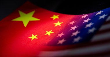 China's and U.S. flags are seen printed on paper in this illustration taken Jan. 27, 2022. (Reuters Photo)