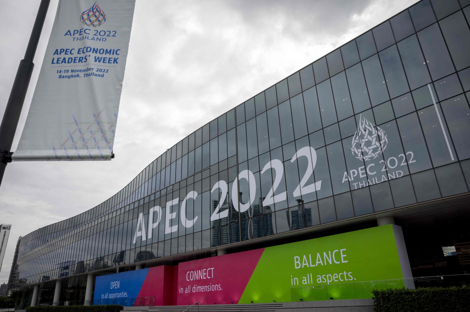Signage for the Asia-Pacific Economic Cooperation (APEC) summit displayed at the Queen Sirikit National Convention Center in Bangkok, Thailand, Nov., 14, 2022. (AFP Photo)