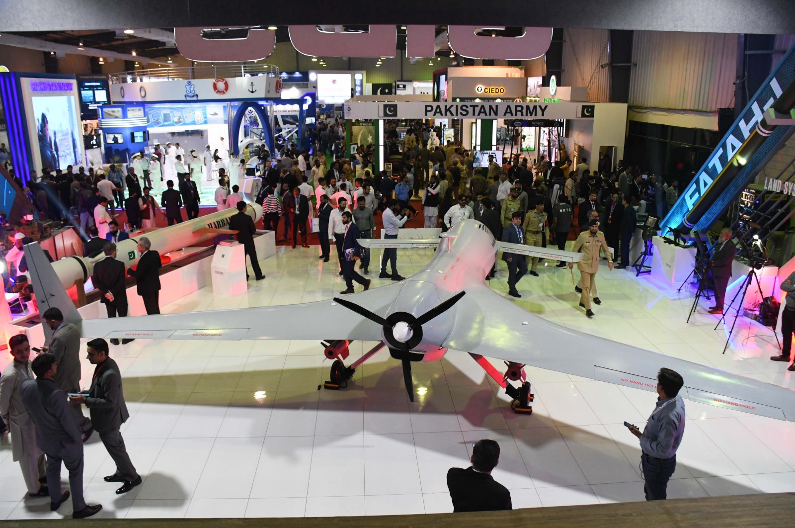 Visitors inspect products at the four-day International Defence Exhibition and Seminar (IDEAS) in Karachi, Pakistan, Nov. 16, 2022. ( AA Photo)