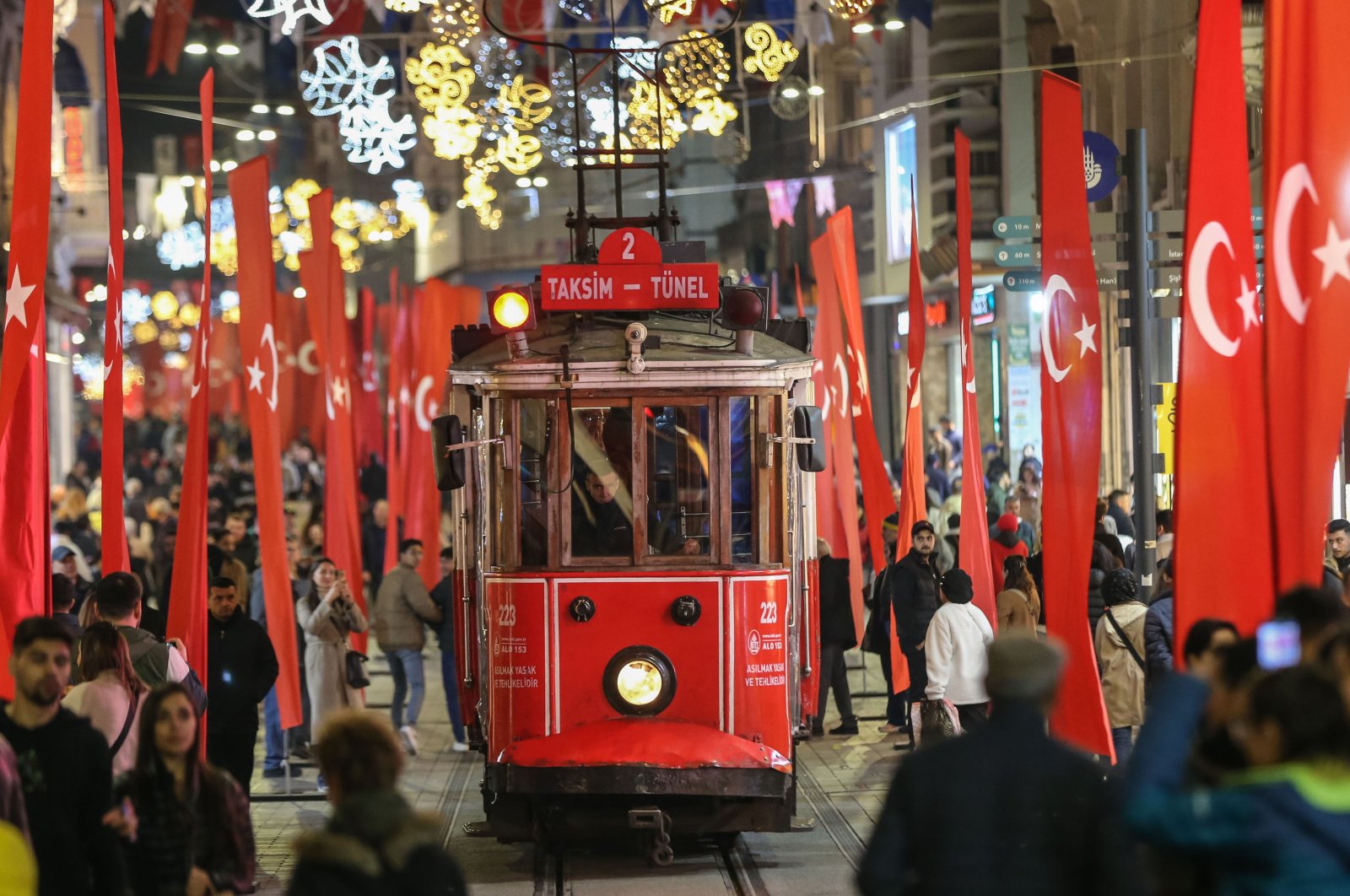 People walk on Istiklal Street, in Istanbul, Türkiye, Nov. 16, 2022. (AA Photo) 