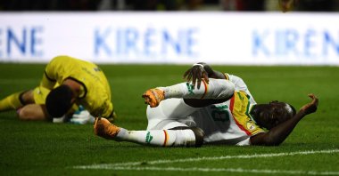 Senegal's forward Sadio Mane (R) reacts on the ground during the friendly football match between Bolivia and Senegal, Orleans, France, Sept. 24, 2022. (AFP Photo)
