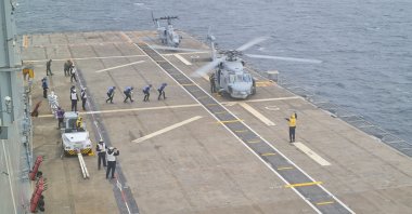 Two helicopters are seen during the deployment on Anadolu LHD, Istanbul, Türkiye, Nov. 18, 2022. (Photo: @tcsavunma)