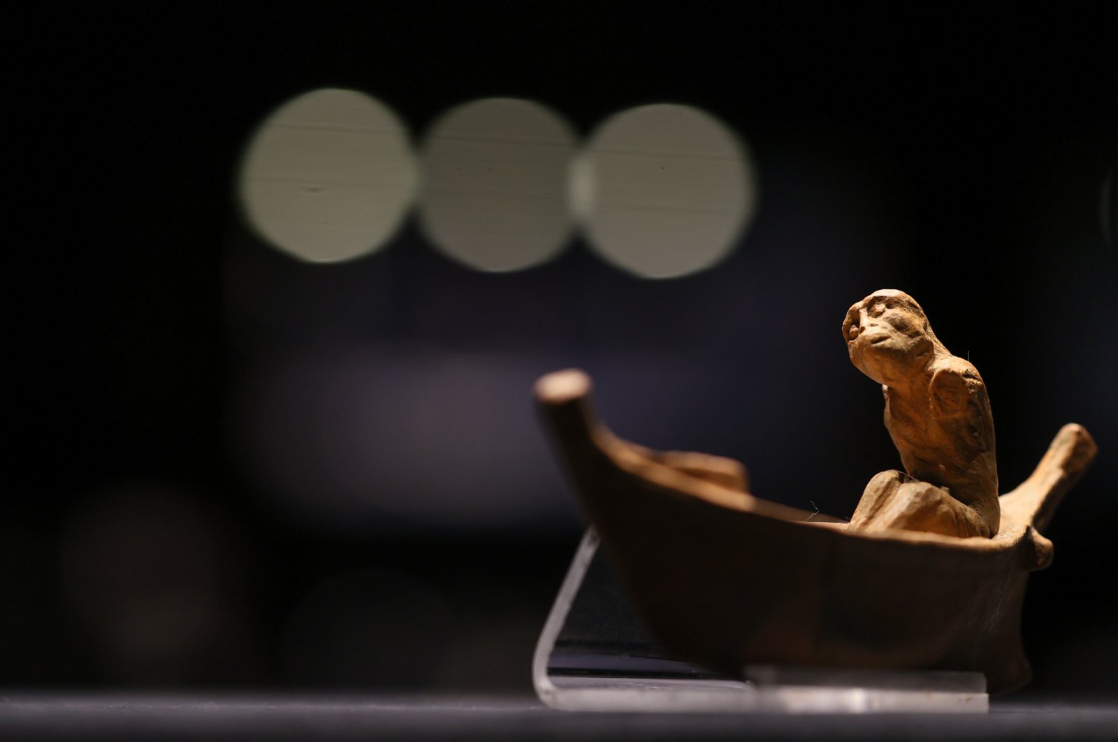 The 2,400-year-old statuette depicting the ferryman of the dead, Charon, on display for the first time at the Izmir Archeology Museum, Türkiye, Nov. 15, 2022. (AA Photo)