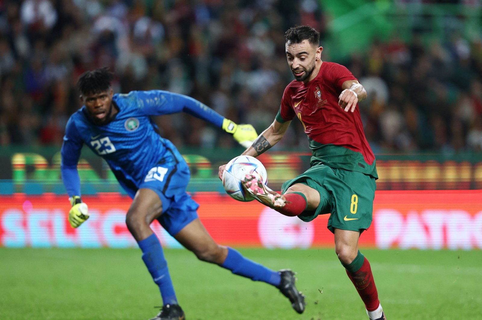 Portugal&#039;s Bruno Fernandes in action with Nigeria&#039;s Francis Uzoho in International Friendly match between Portugal and Nigeria at Jose Alvalade Stadium, Lisbon, Portugal, Nov. 17, 2022. (Reuters Photo)