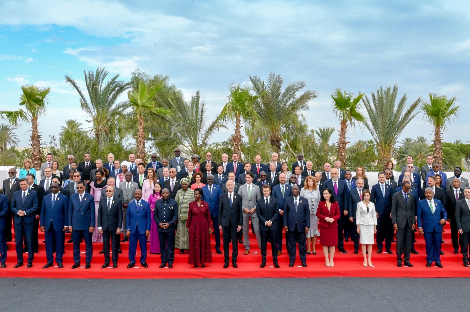 A handout photo made available by the Tunisian presidency press service shows Tunisia&#039;s President Kais Saied (8-R) posing for a group with Secretary General of La Francophonie Louise Mushikiwabo, (9-R) French President Emmanuel Macron (7-R), Ivory Coast&#039;s President Alassane Ouattara (6-R), Canada&#039;s Prime Minister Justin Trudeau (C), and other officials and leaders of French-speaking countries, at the 18th Francophonie Summit in Djerba, Tunisia, Nov. 19, 2022. (EPA Photo)