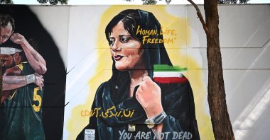 Mural of Mahsa Amini, the 22-year-old Iranian woman who was arrested and beaten to death in Tehran by police, is seen in Sydney, Australia, Oct. 28, 2022. (EPA Photo)