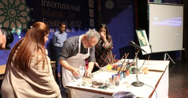 Turkish marbling art is being introduced at the International Islamic Arts Festival in Lahore, Pakistan, Oct. 18, 2022. (AA Photo)