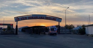 An ambulance is seen entering an accommodation facility in Türkiye's southeastern province Kilis bordering Syria after a rocket attack, Nov. 20, 2022. (AA Photo)