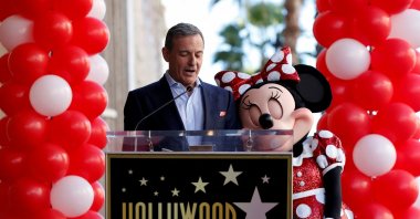 Bob Iger speaks next to the character of Minnie Mouse at the unveiling of her star on the Hollywood Walk of Fame in Los Angeles, California, U.S., Jan. 22, 2018. (Reuters Photo)