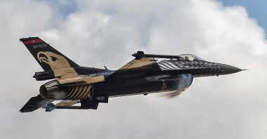 In this file photo taken on September 20, 2018, Solo Turk, the aerobatic team of the Turkish Air Force, flies their F-16 Fighters over Istanbul&#039;s new airport. (AFP Photo)