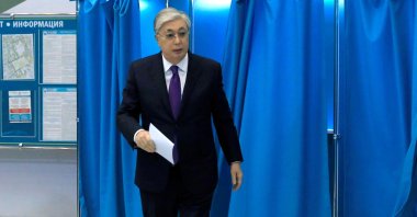 Kazakhstan&#039;s President Kassym-Jomart Tokayev walks out of a voting booth, Astana, Kazakhstan, Nov. 20, 2022. (Reuters Photo)