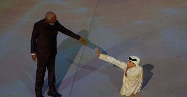 U.S. actor Morgan Freeman (L) and Qatar's FIFA Ambassador Ghanim Al Muftah attend the opening ceremony ahead of the Qatar 2022 World Cup Group A football match between Qatar and Ecuador at the Al-Bayt Stadium, Al Khor, Doha, Qatar, Nov. 20, 2022. (AFP Photo)
