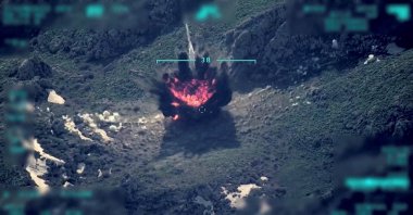 A view of a target being hit during a Claw military operation is seen in this still image taken from a handout video recorded at an unknown location in northern Iraq and released on April 18, 2022. (Reuters Photo)