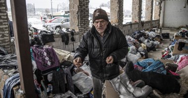 A man is seen at a ruined administrative building in Moschun Village, Kyiv, Ukraine, Nov. 19, 2022. (AA Photo)