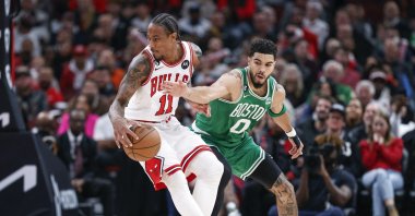 Chicago Bulls forward DeMar DeRozan (11) is defended by Boston Celtics forward Jayson Tatum (0) during the second half at United Center, Chicago, Illinois, U.S., Nov 21, 2022. (Reuters Photo)