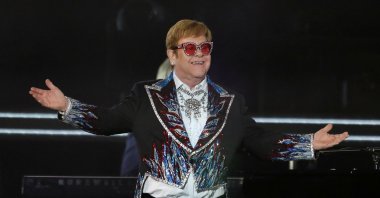 Elton John performs "Bennie and the Jets" as he wraps up the U.S. leg of his "Yellow Brick Road" tour at Dodger Stadium in Los Angeles, California, U.S. Nov. 20, 2022. (Reuters Photo)