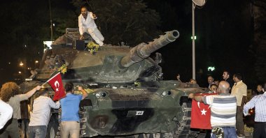 People confront tanks controlled by putschists, in the capital Ankara, Türkiye, July 15, 2022. (AA Photo) 