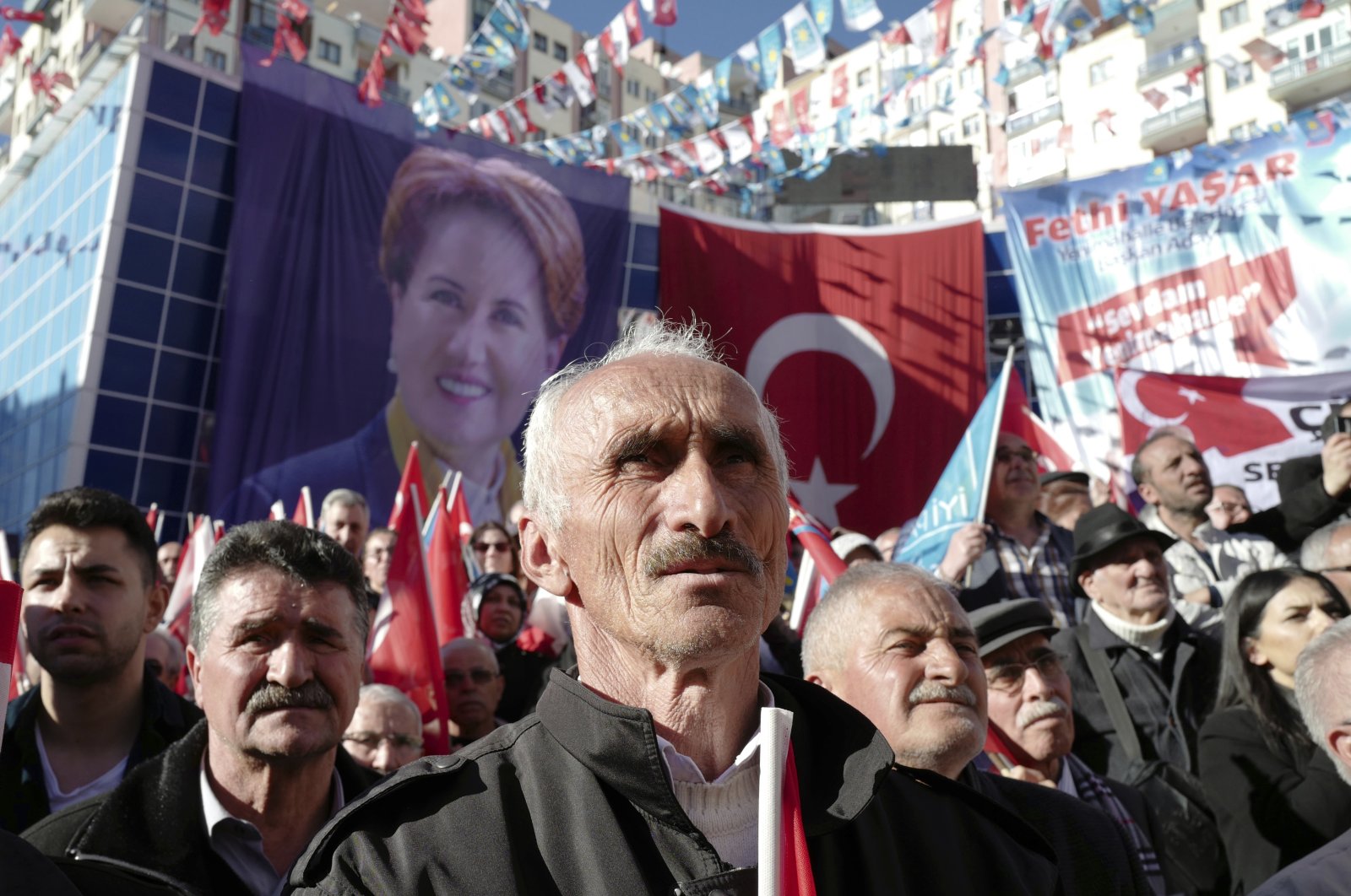 People listen to the chairperson of the opposition Good Party (IP) Meral Akşener, as she addresses her supporters during a rally in Ankara, Türkiye, March 25, 2019. ( AP Photo)