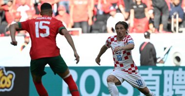Croatia's midfielder Luka Modric runs with the ball during the Qatar 2022 World Cup Group F football match between Morocco and Croatia at the Al-Bayt Stadium, Al Khor, Doha, Nov. 23, 2022. (AFP Photo)